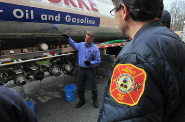 Fire fighter observing a lecture from a Dennis K. Burke driver