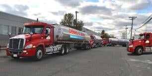 Dennis K Burke refueling trucks in a convoy