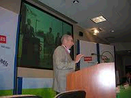 Ed Burke at a podium giving a lecture