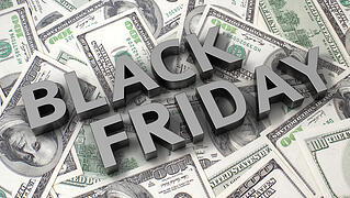 Black Friday overliad on 100 dollar bills