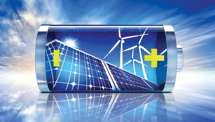 Image of a battery reflecting solar panels and wind turbines on its surface