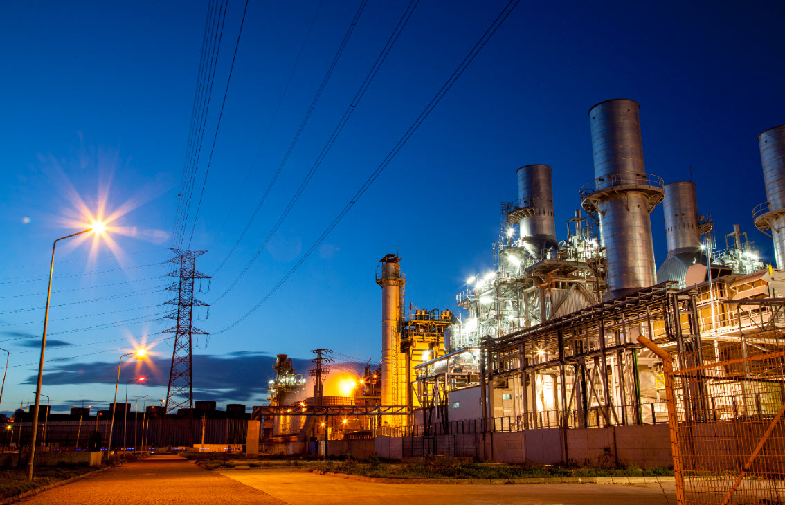 Image of a power plant at dusk 
